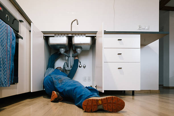 Professional Drain Cleaning technician working in Purlear, NC